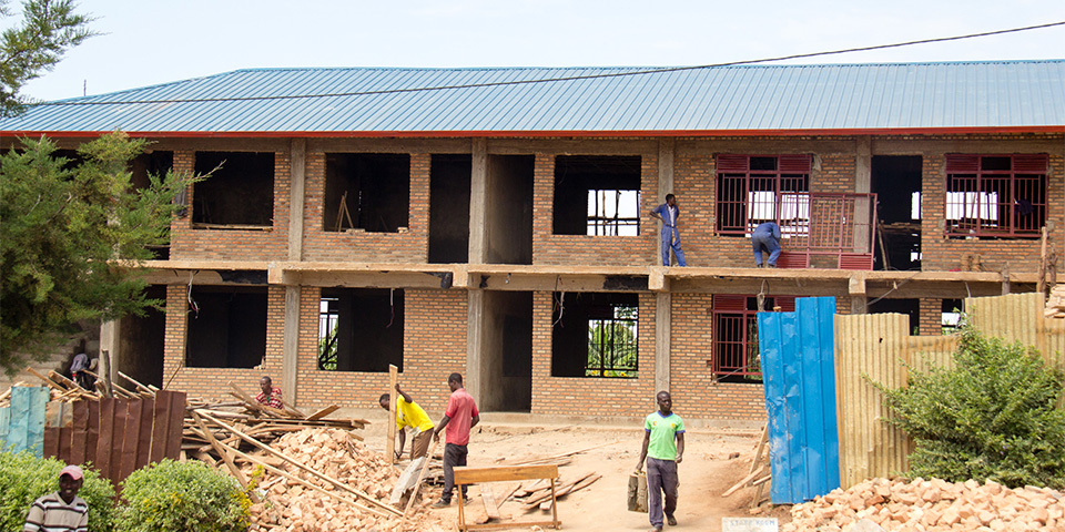 Constructing new classrooms at Gikomero.